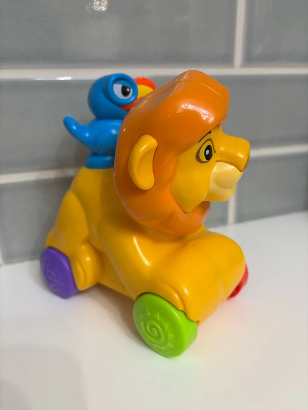 Fisher-Price Disney Baby Rollin' Tunes Mufasa push-along toy